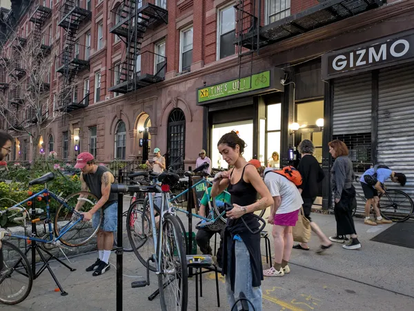 Repairs overflow onto the sidewalk when it is too crowded inside